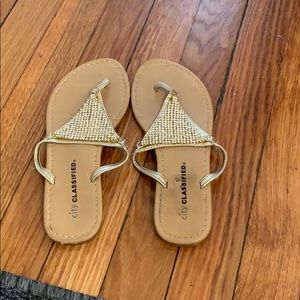 Tan and gold sandals with gold jewels. Size 5.5
